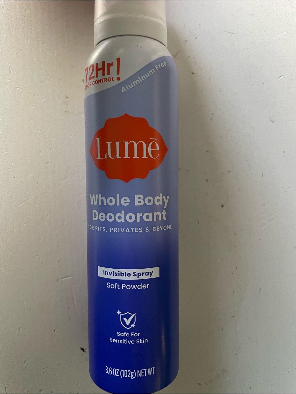 Lumē Soft Powder Whole Body Spray — Lavender Bottle with Orange Accents